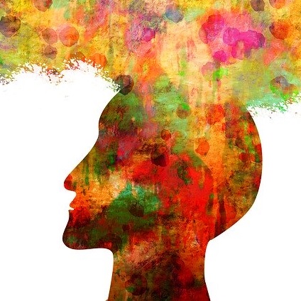 peinture d'un profil dont de multiple couleur émanent de son cerveau